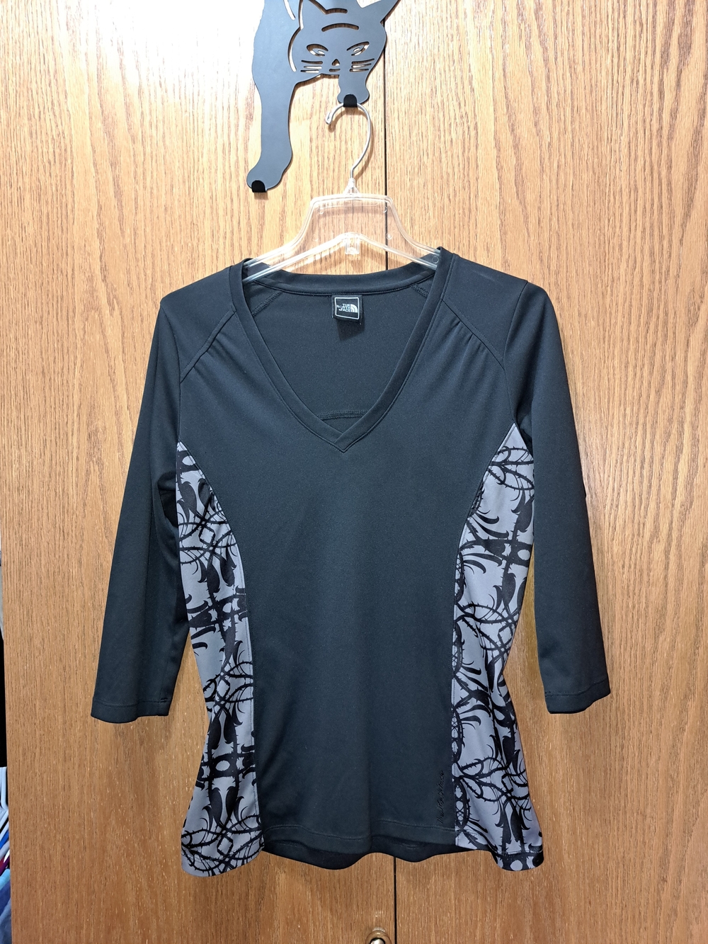 The North Face Black Long-Sleeve V-Neck Top with Gray Patterned Side Panels